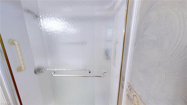 bathroom featuring a stall shower