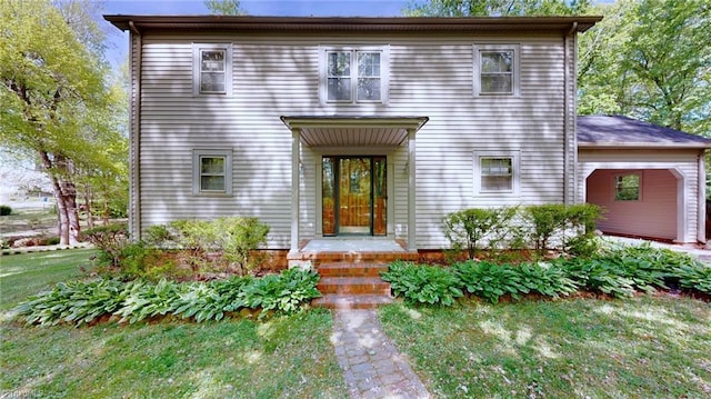 view of front facade featuring a front yard