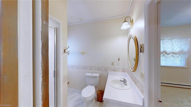 bathroom with a baseboard heating unit, a textured ceiling, toilet, crown molding, and vanity