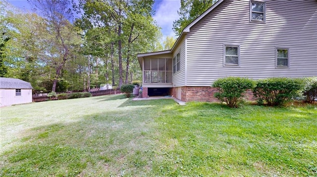 view of yard with a sunroom