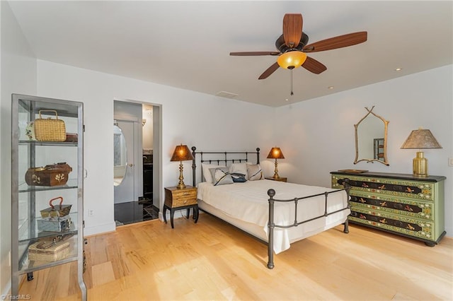 bedroom featuring wood-type flooring and ceiling fan