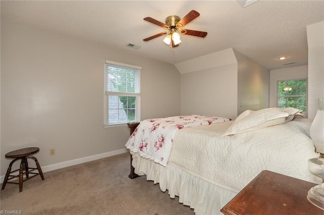 bedroom featuring carpet, visible vents, baseboards, and ceiling fan