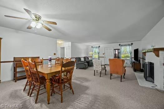 1630 Ploughboy Ln, Winston-Salem, NC 27103 - dining area with carpet flooring and a ceiling fan