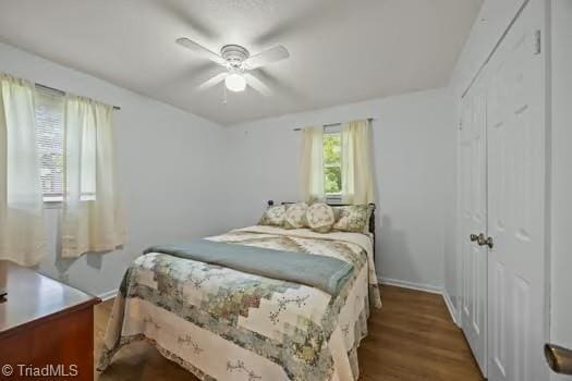 1630 Ploughboy Ln, Winston-Salem, NC 27103 - bedroom featuring a closet, wood finished floors, and a ceiling fan