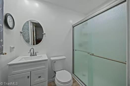 1630 Ploughboy Ln, Winston-Salem, NC 27103 - full bath with vanity and a shower with door