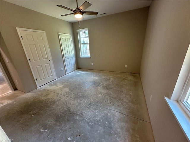 311 W Market St, Graham, NC 27253 - unfurnished bedroom featuring a ceiling fan