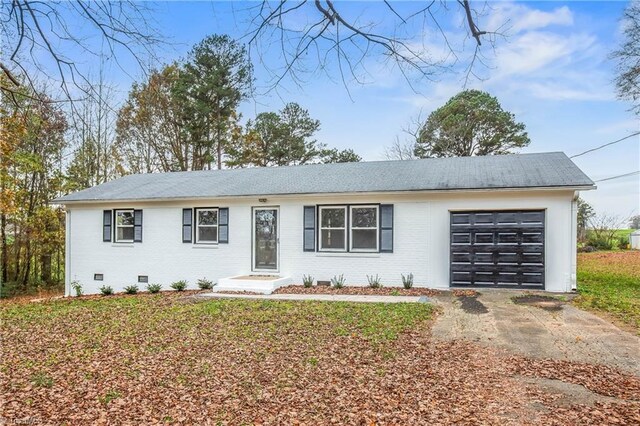 back of property featuring a yard and a deck