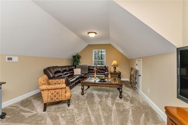 living room with carpet and lofted ceiling