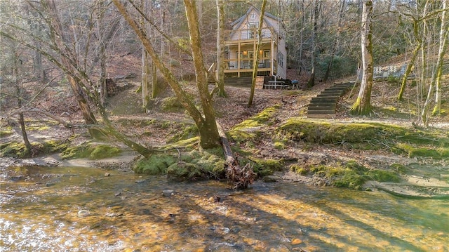 view of yard with a water view