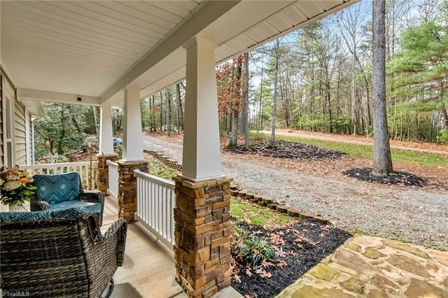 view of patio featuring a porch