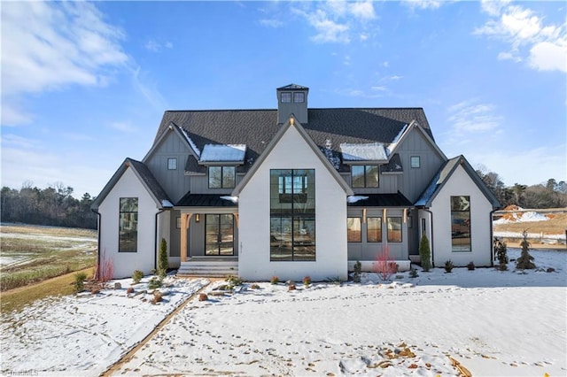 view of snow covered property