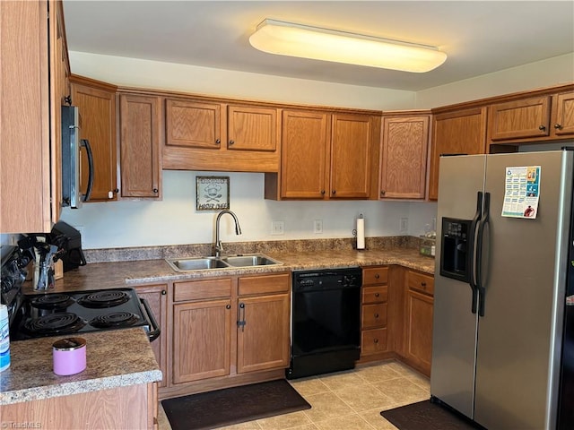6108 Trotting Pl, Greensboro, NC 27405 - kitchen with stainless steel fridge with ice dispenser, black dishwasher, and brown cabinets