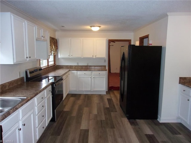 kitchen with black appliances, a textured ceiling, white cabinetry, and dark hardwood / wood-style flooring