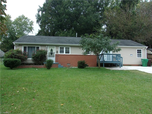 ranch-style house with a front lawn