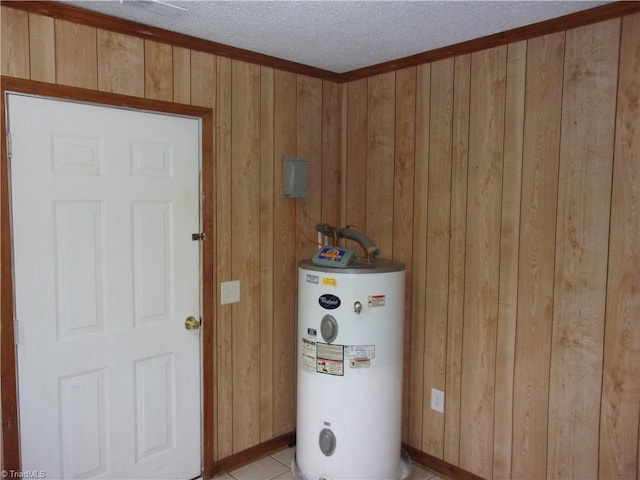 utility room featuring water heater