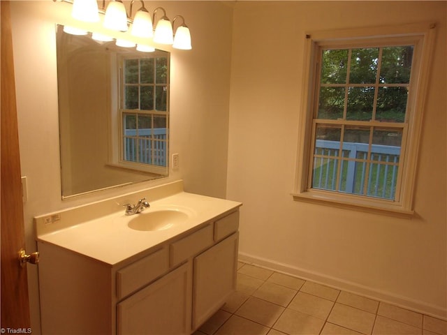 bathroom featuring tile patterned flooring and vanity