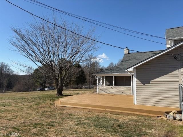 view of yard with a deck