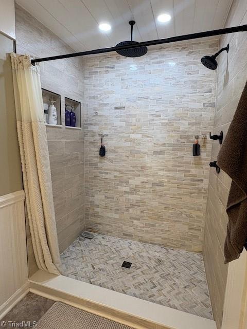 bathroom with a shower stall