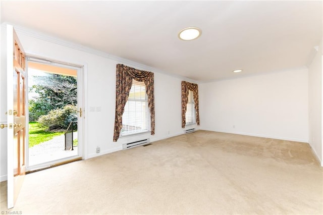 empty room featuring baseboards, a wealth of natural light, and light colored carpet