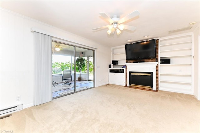 unfurnished living room with carpet flooring, a ceiling fan, and a fireplace