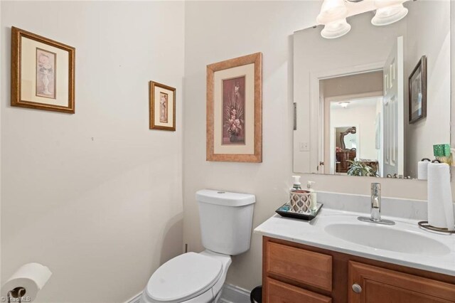 6065 Providence Church Rd, Winston-Salem, NC 27105 - half bathroom with vanity and toilet