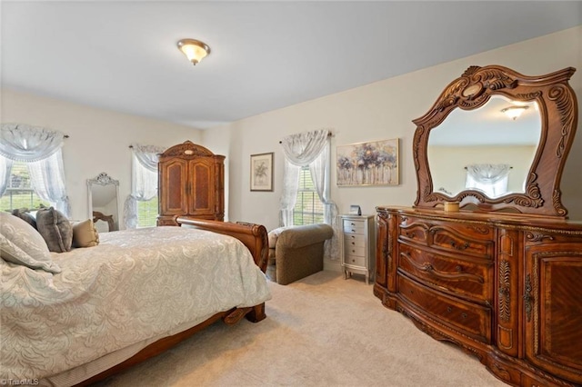 6065 Providence Church Rd, Winston-Salem, NC 27105 - bedroom featuring multiple windows and light colored carpet