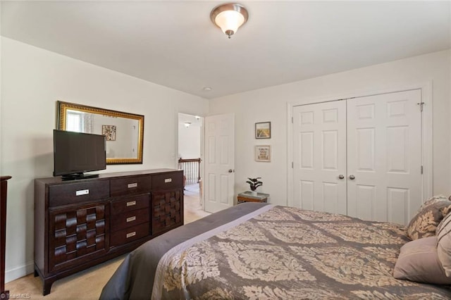 6065 Providence Church Rd, Winston-Salem, NC 27105 - bedroom with a closet, light colored carpet, and baseboards