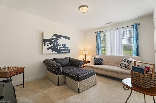 6065 Providence Church Rd, Winston-Salem, NC 27105 - living area featuring carpet, visible vents, and baseboards