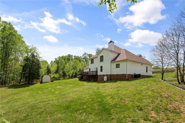 6065 Providence Church Rd, Winston-Salem, NC 27105 - view of yard with a storage unit, a wooden deck, central AC unit, and an outbuilding