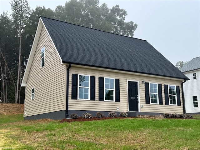 view of front of home with a front yard