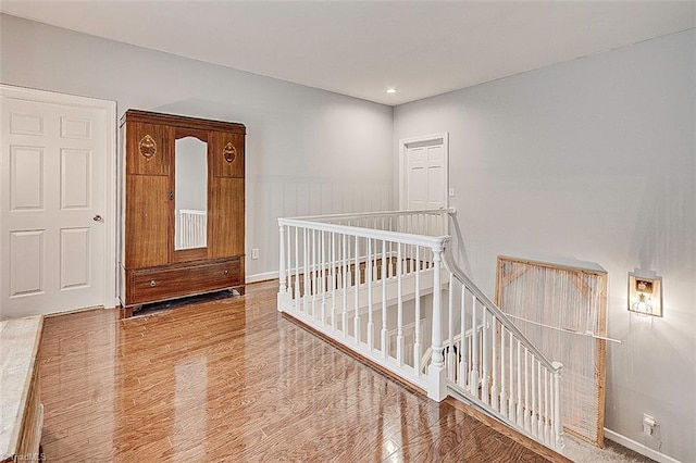 entryway with hardwood / wood-style flooring