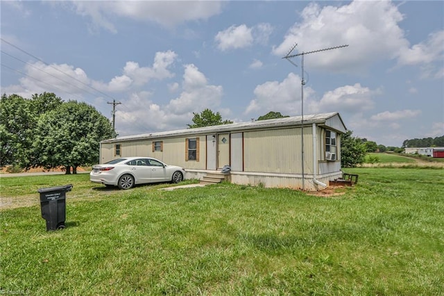 1105 Cabana Ln, East Bend, NC 27018 - manufactured / mobile home with a front lawn and cooling unit