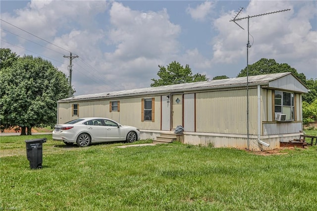 1105 Cabana Ln, East Bend, NC 27018 - manufactured / mobile home with a front lawn and cooling unit