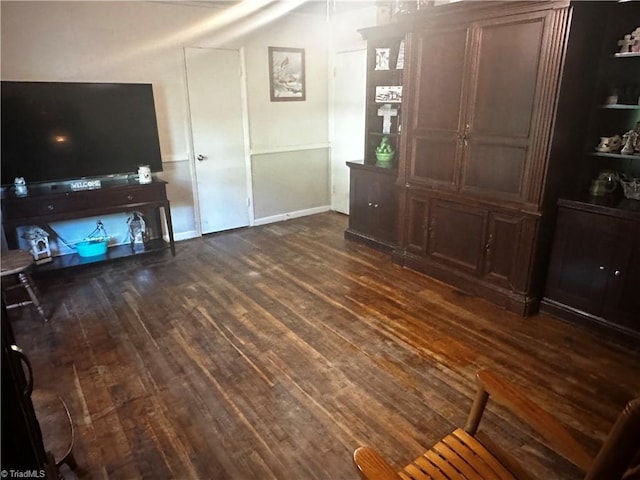 living room featuring dark hardwood / wood-style floors