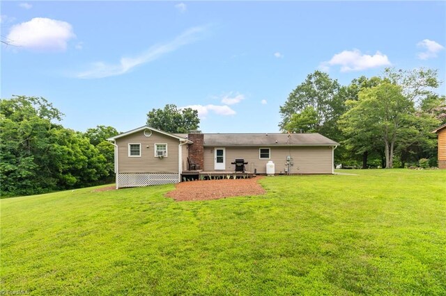 3809 Evergreen Dr, Trinity, NC 27370 - back of property featuring a wooden deck and a lawn