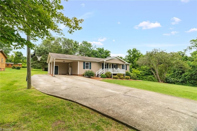 3809 Evergreen Dr, Trinity, NC 27370 - ranch-style house featuring driveway, a porch, a front lawn, and a carport