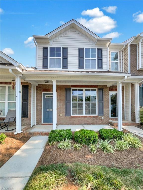 view of front of home featuring covered porch