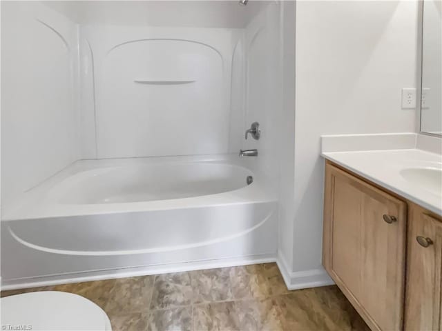 full bathroom with vanity, tub / shower combination, and toilet