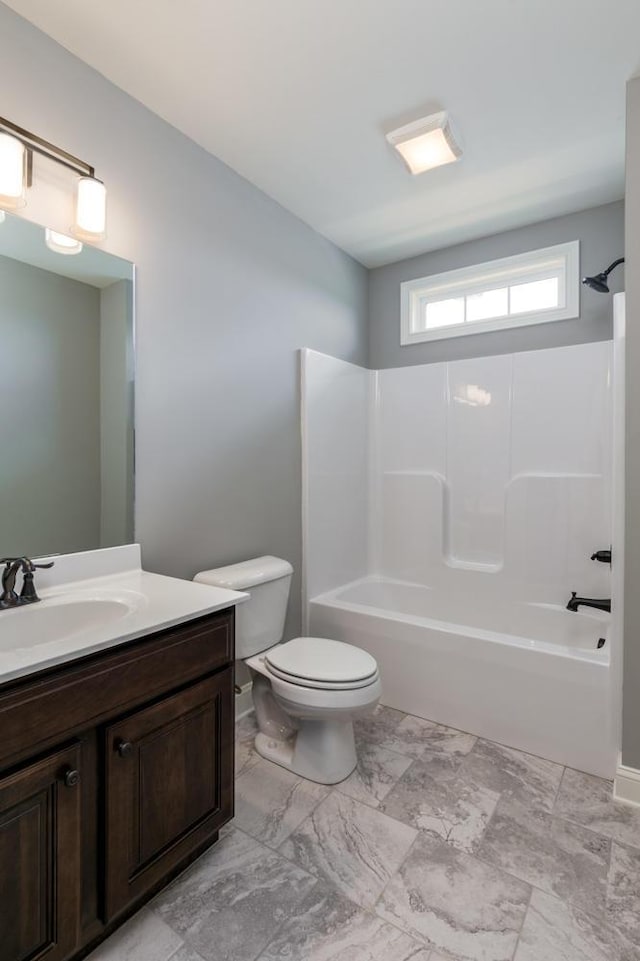 full bathroom featuring shower / bathing tub combination, tile flooring, toilet, and vanity