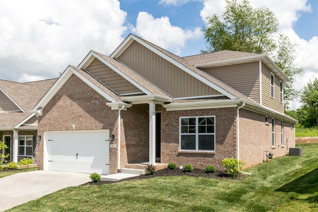 craftsman inspired home featuring central AC, a front yard, and a garage