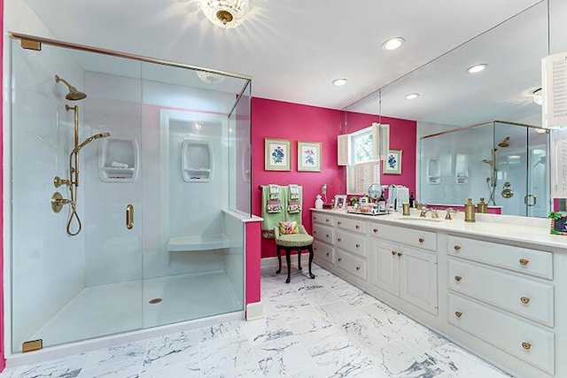 bathroom featuring tile flooring, vanity, and a shower with shower door