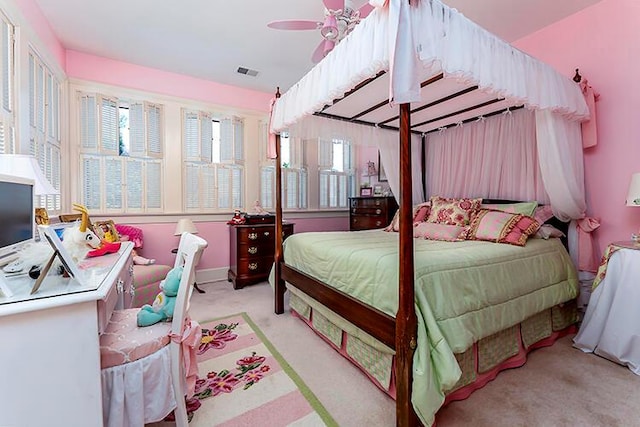 bedroom featuring ceiling fan and light colored carpet