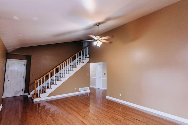 unfurnished living room with ceiling fan and light wood-type flooring