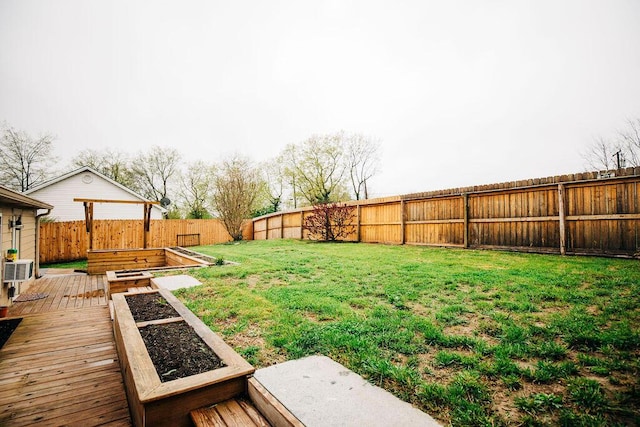 view of yard featuring a wooden deck