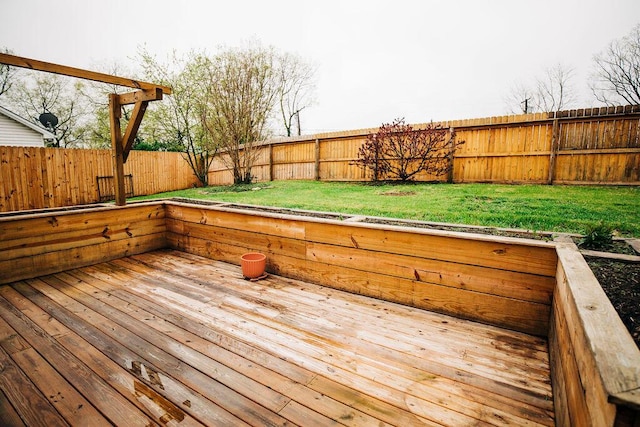 wooden terrace with a yard