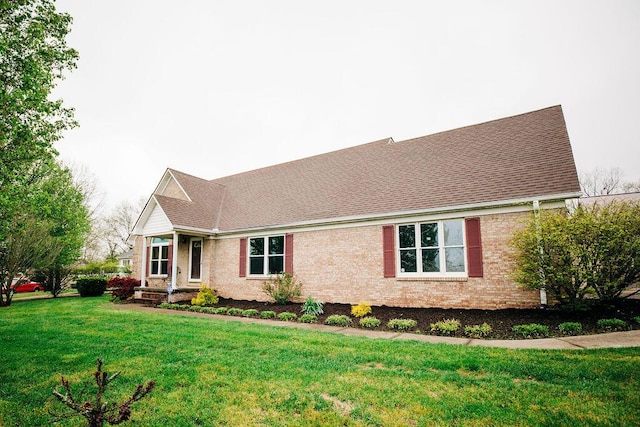 single story home with a front yard