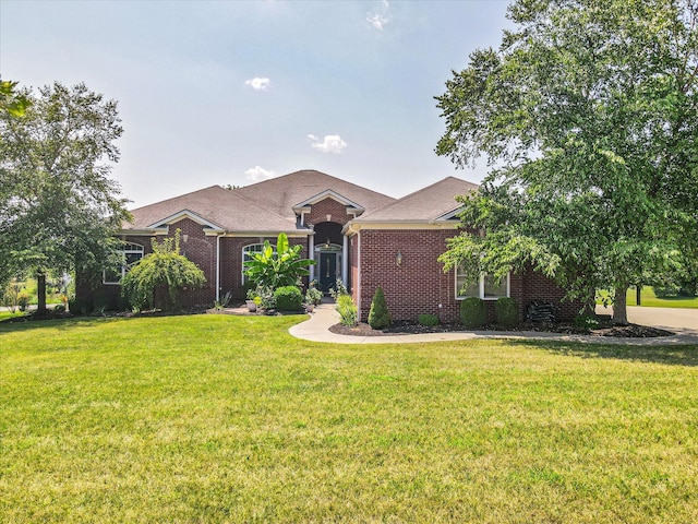 ranch-style home with a front lawn