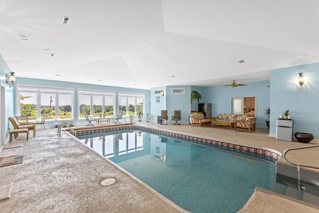 view of pool featuring ceiling fan