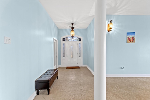 hall featuring light tile patterned floors