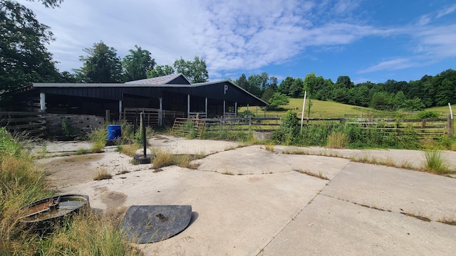 exterior space featuring a rural view